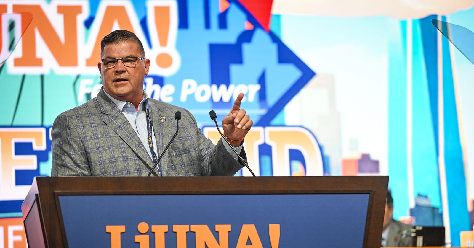Mike Hellstrom at a podium